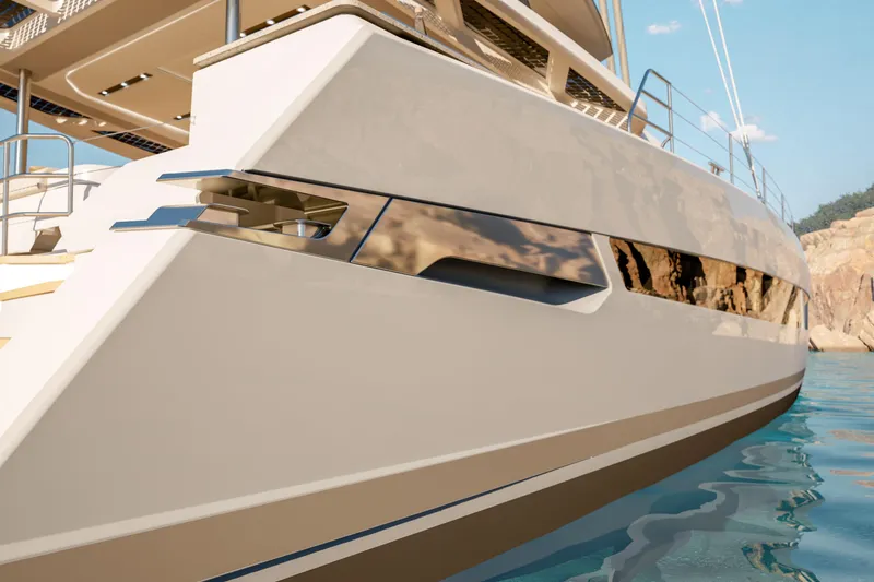 Slide: The Image of Luxury Fountaine Pajot 70 S yacht, 2027 model, sleek design on tranquil water. - 7