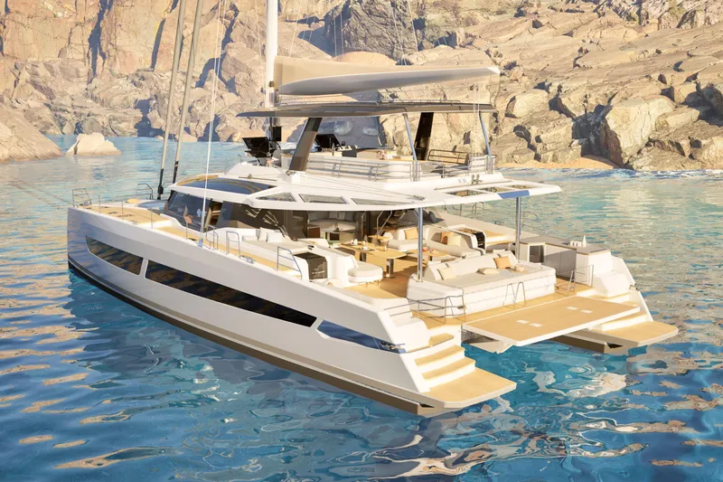 Slide: The Image of Luxury Fountaine Pajot 70 S catamaran, 2027 model, sailing near rocky coastline. - 1