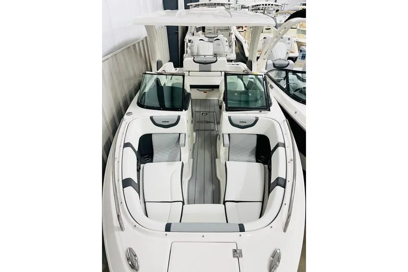 Slide: The Image of 2026 Chaparral 270 OSX boat interior with sleek seating and modern design. - 9