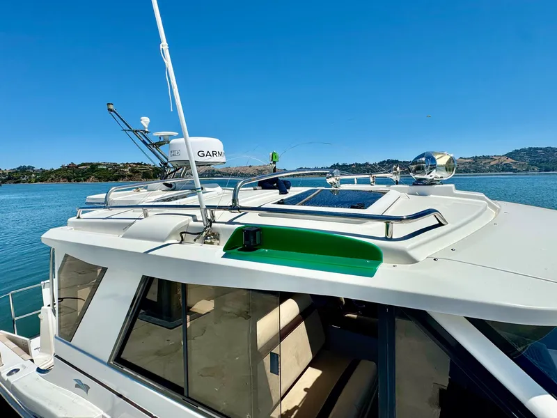 Slide: The Image of 2015 Cutwater C26 boat with Garmin radar on calm water. - 3