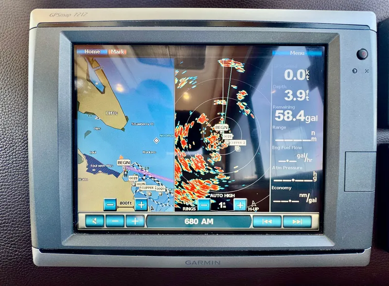 Slide: The Image of Garmin GPS display on 2015 Cutwater C26 boat, showing navigation and radar data. - 30