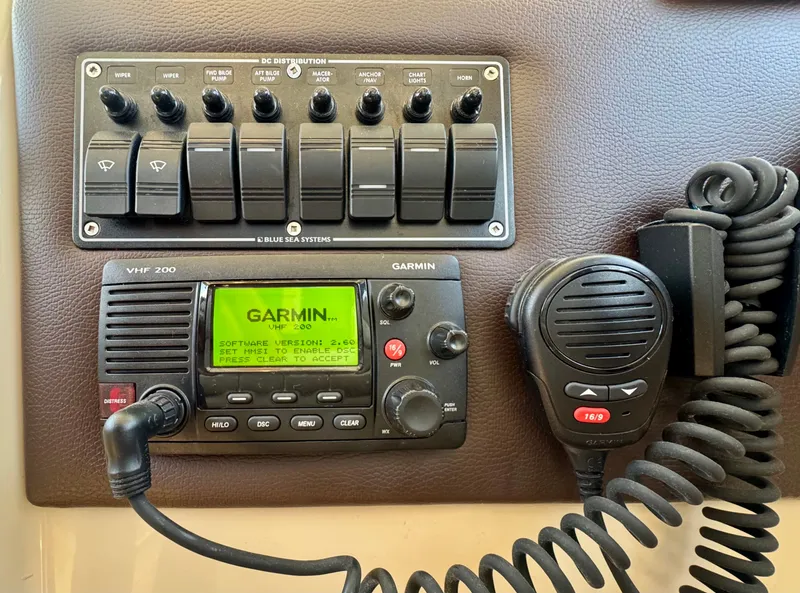 Slide: The Image of Control panel of a 2015 Cutwater C26 boat with Garmin VHF 200 radio. - 35