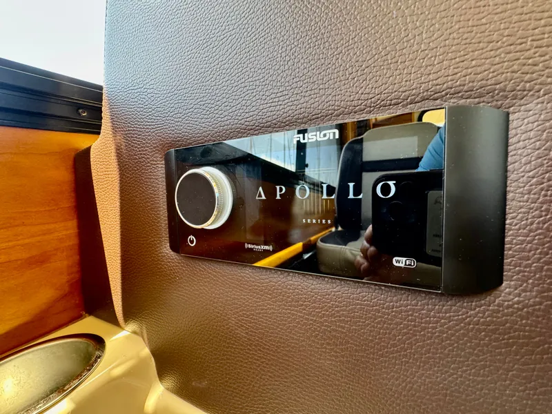 Slide: The Image of Fusion Apollo Series stereo system in 2015 Cutwater C26 boat interior. - 36