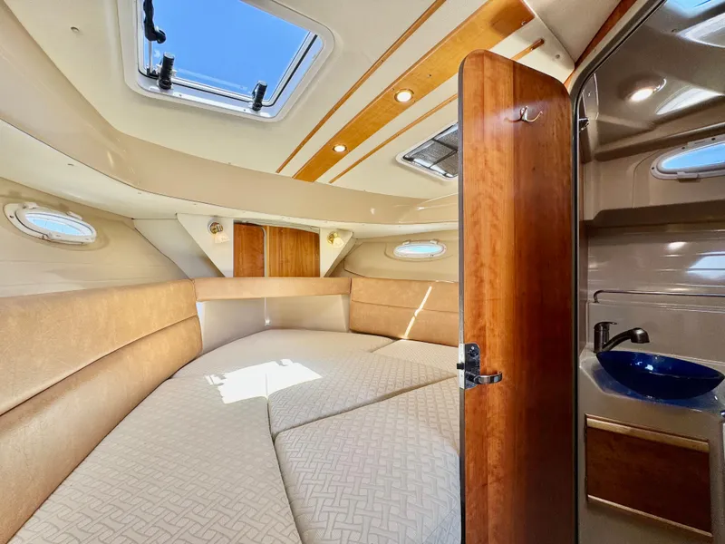 Slide: The Image of Interior of 2015 Cutwater C26 boat with cozy cabin and modern amenities. - 37