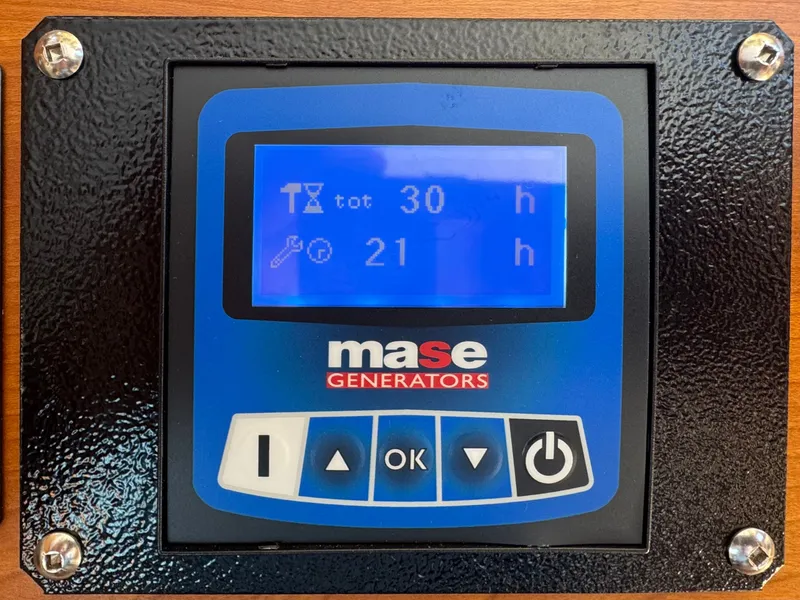 Slide: The Image of Mase Generators control panel displaying usage hours on a Cutwater C26, 2015 model. - 47