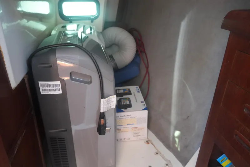 Slide: The Image of Portable air conditioner in 1986 Hunter 28.5 sailboat interior cabin space. - 23