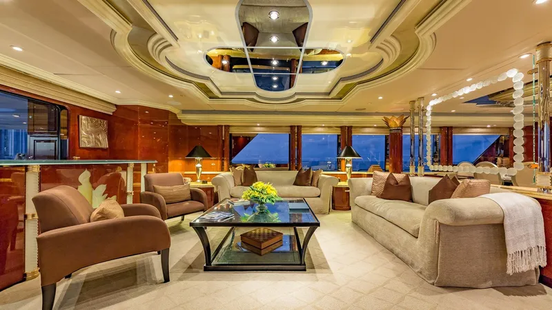 Slide: The Image of Luxurious interior of 2002 Christensen Tri Deck yacht with elegant seating and decor. - 15