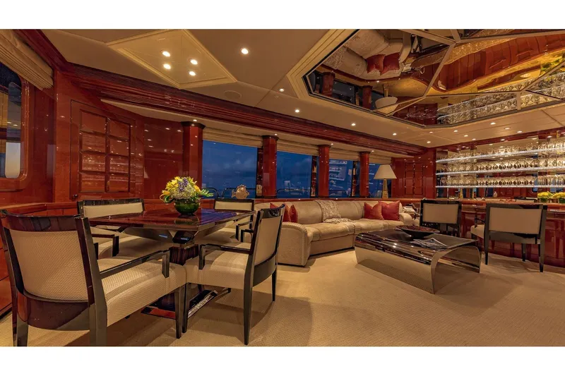 Slide: The Image of Luxurious interior of 2002 Christensen Tri Deck yacht with elegant furnishings and ambient lighting. - 32