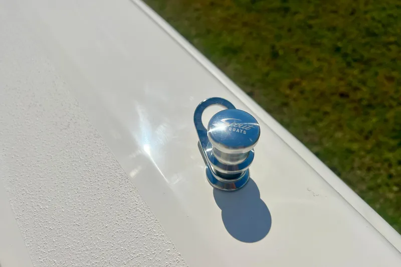 Slide: The Image of 2026 Scout 357 LXF boat storage compartment with stainless steel railings. - 37