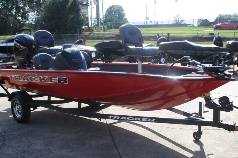 Slide: The Image of 2026 Tracker Pro Team 175 boat in vibrant red on a trailer. - 6