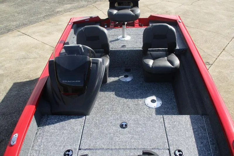 Slide: The Image of 2026 Tracker Pro Team 175 boat interior with gray seating and red accents. - 9