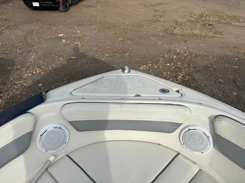 Slide: The Image of Bow seating area of a 2010 Sea Ray 210 SL SS boat with speakers. - 9