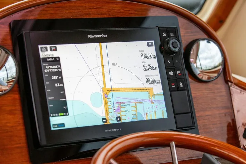 Slide: The Image of Navigation system on 2004 Hinckley Picnic Boat EP displaying nautical chart. - 14