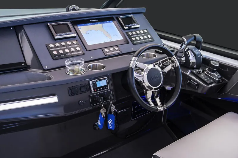 Slide: The Image of Spacious seating area on 2019 Monterey 378 Super Express boat, overlooking calm water. - 4