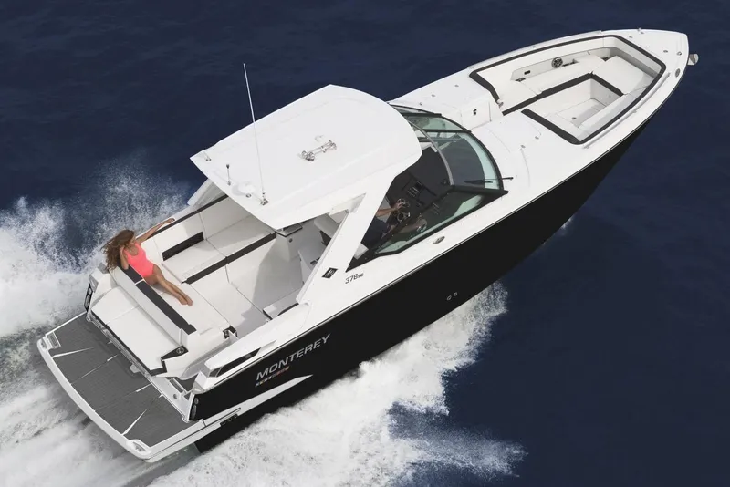 The Image of 2019 Monterey 378 Super Express boat on trailer under clear blue sky. - 0