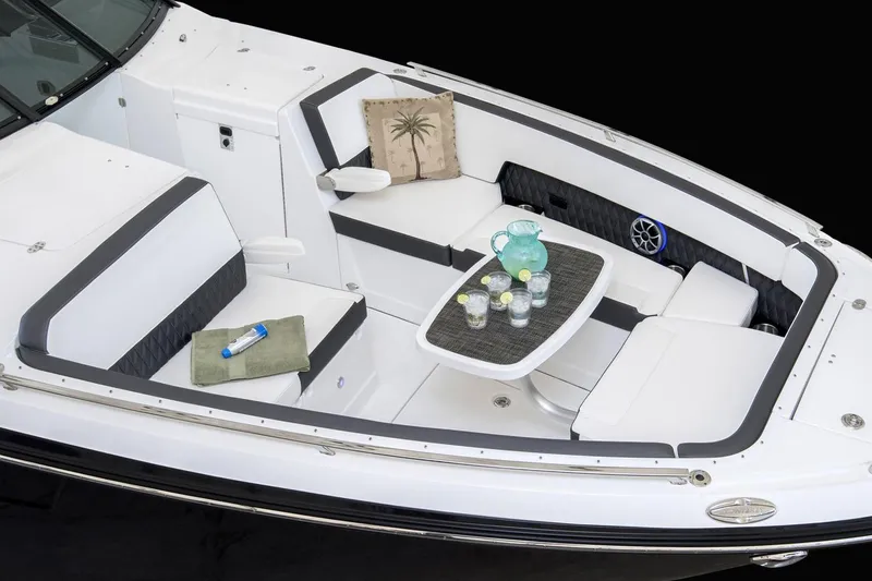 Slide: The Image of 2019 Monterey 378 Super Express boat docked in a marina, covered with a black tarp. - 2