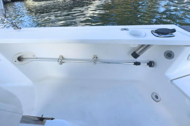 Slide: The Image of 2008 Trophy 1703 Center Console boat docked at marina with canopy. - 7