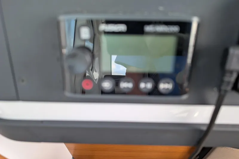 Slide: The Image of Close-up of a control panel in a 2019 Axopar 28 CABIN boat. - 26