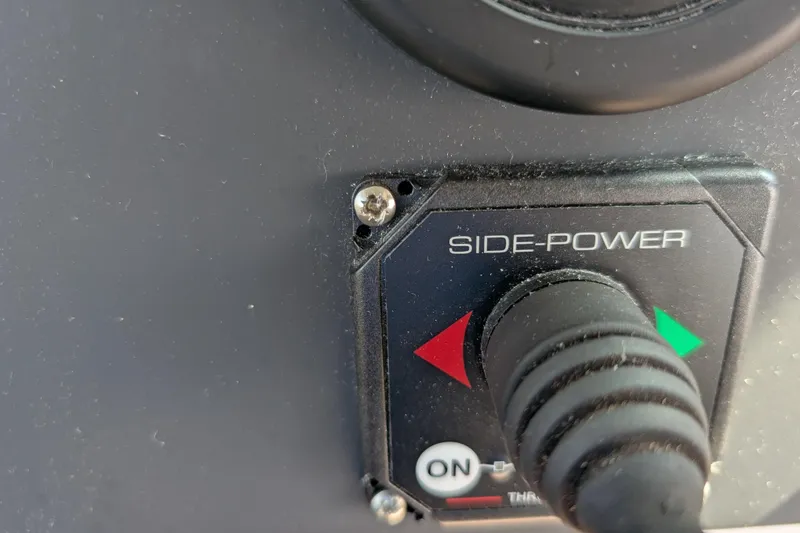 Slide: The Image of Control panel of 2019 Axopar 28 CABIN boat with Side-Power joystick. - 36