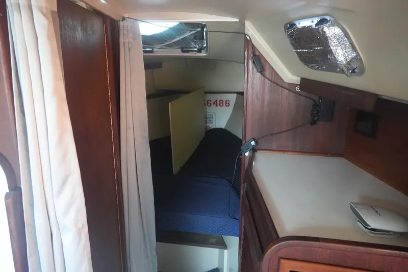 Slide: The Image of Interior of a 1989 Catalina 30 Tall Rig Mark II yacht. - 11