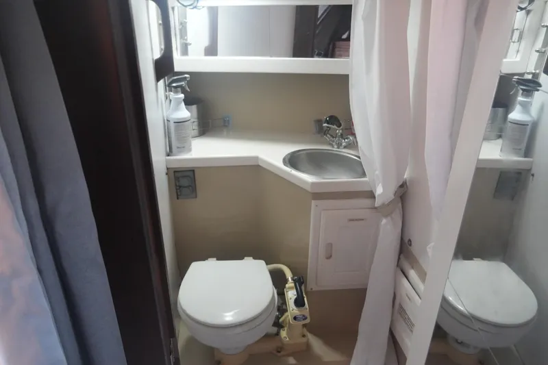 Slide: The Image of Bathroom of a 1989 Catalina 30 Tall Rig Mark II yacht. - 13