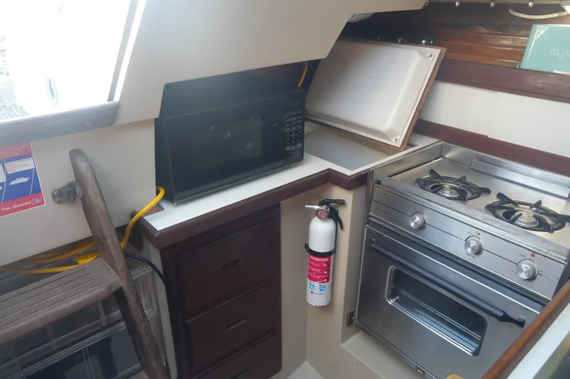 Slide: The Image of Galley area of a 1989 Catalina 30 Tall Rig Mark II yacht. - 18