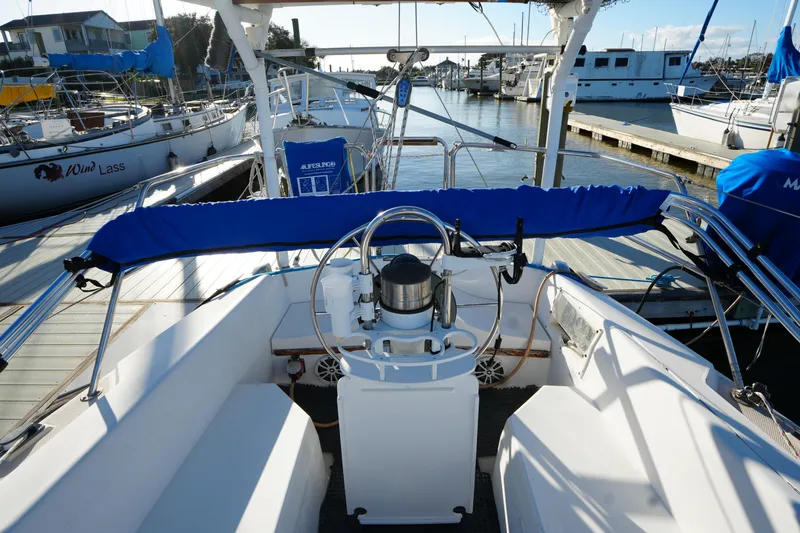 Slide: The Image of Cockpit of a 1989 Catalina 30 Tall Rig Mark II in harbor. - 9