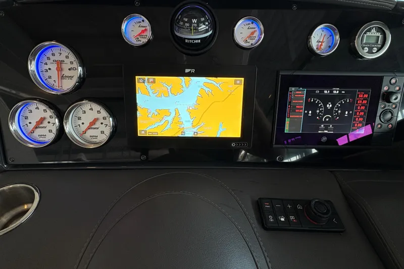 Slide: The Image of Dashboard display of a 2021 Formula 330 Crossover Bowrider I/O boat, showing engine metrics. - 11