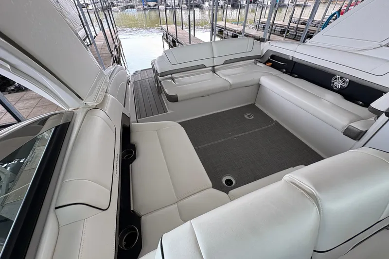 Slide: The Image of 2021 Formula 330 Crossover Bowrider I/O interior with sleek seating and modern dashboard. - 21