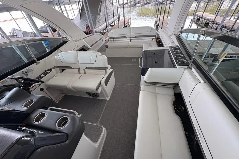 Slide: The Image of 2021 Formula 330 Crossover Bowrider I/O interior with spacious seating and modern design. - 22