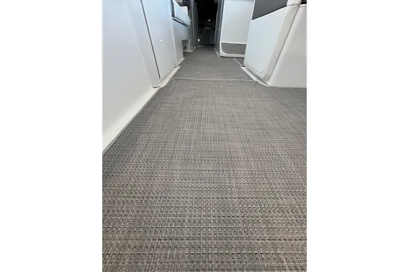 Slide: The Image of 2021 Formula 330 Crossover Bowrider I/O storage compartment interior view. - 28