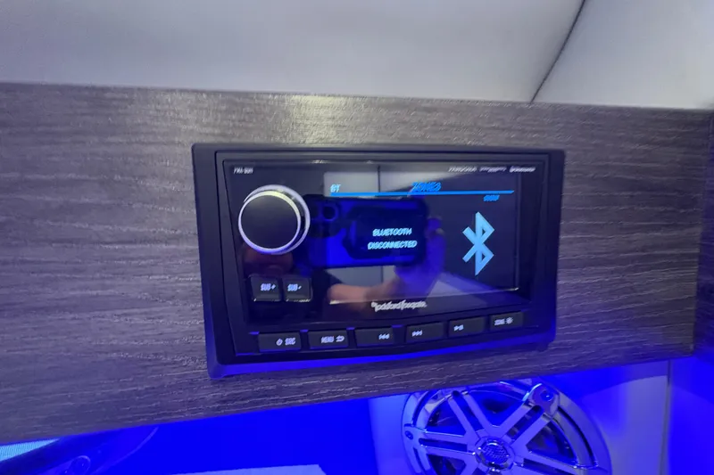 Slide: The Image of Luxurious interior of 2021 Formula 330 Crossover Bowrider I/O with blue ambient lighting. - 35