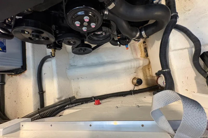 Slide: The Image of Engine compartment of 2021 Formula 330 Crossover Bowrider I/O with diamond plate flooring. - 43