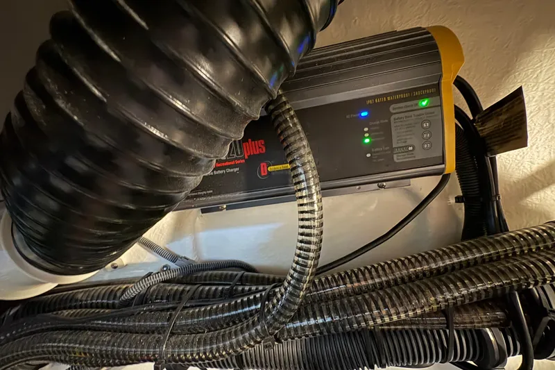 Slide: The Image of Engine compartment of a 2021 Formula 330 Crossover Bowrider I/O boat. - 44