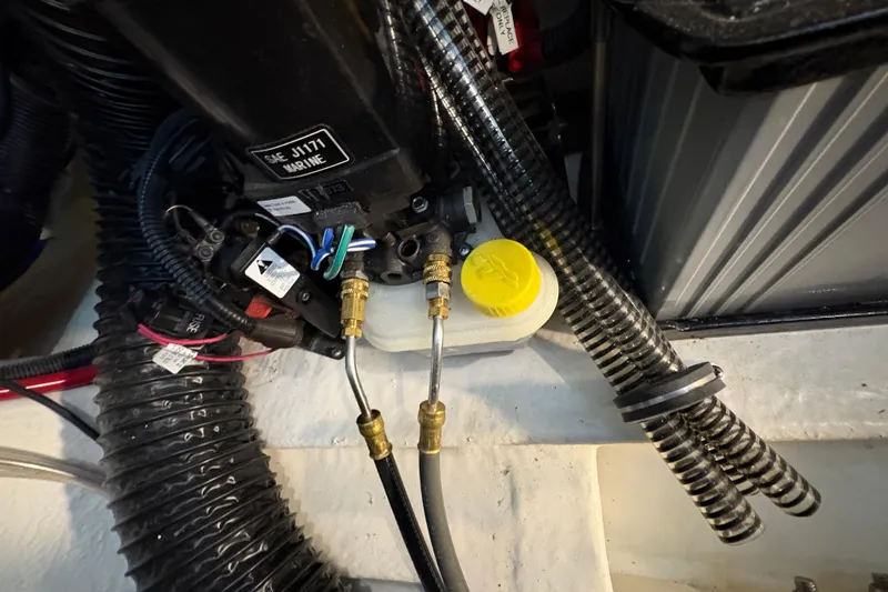 Slide: The Image of Battery charger in a 2021 Formula 330 Crossover Bowrider I/O boat engine compartment. - 45