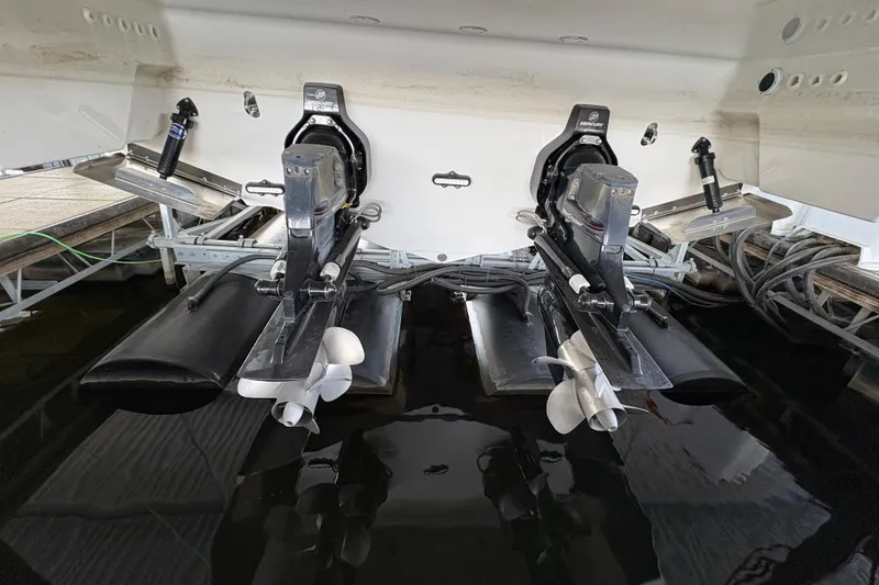 Slide: The Image of 2021 Formula 330 Crossover Bowrider I/O with dual Mercury outdrives in marina setting. - 48