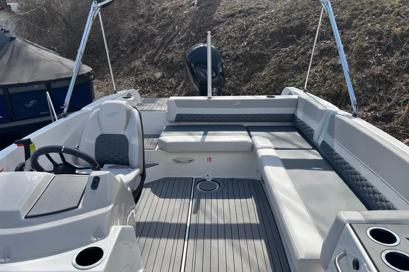 Slide: The Image of 2026 Starcraft SVX 211 OB boat interior with sleek seating and modern design. - 8