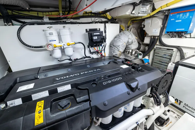 Slide: The Image of Engine room of 2025 Fairline Squadron 58 yacht with Volvo Penta D13-1000 engine. - 102