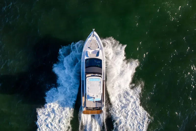 Slide: The Image of Aerial view of 2025 Fairline Squadron 58 yacht cruising on open water. - 107