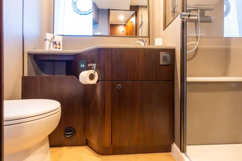 Slide: The Image of Control panel on 2025 Fairline Squadron 58 yacht, featuring sleek design and modern technology. - 19