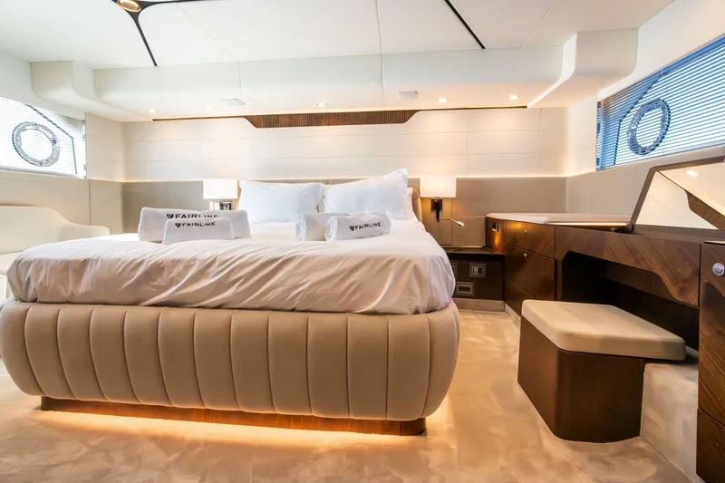 Slide: The Image of Luxurious interior of 2025 Fairline Squadron 58 yacht with modern kitchen and seating area. - 23