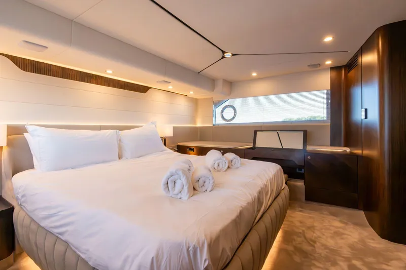 Slide: The Image of Modern kitchen in 2025 Fairline Squadron 58 yacht with sleek appliances and wood cabinetry. - 25