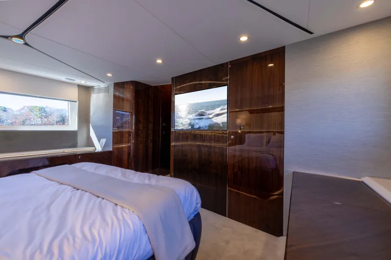 Slide: The Image of Luxurious bedroom interior of 2025 Fairline Squadron 58 yacht with modern design and ocean view. - 53