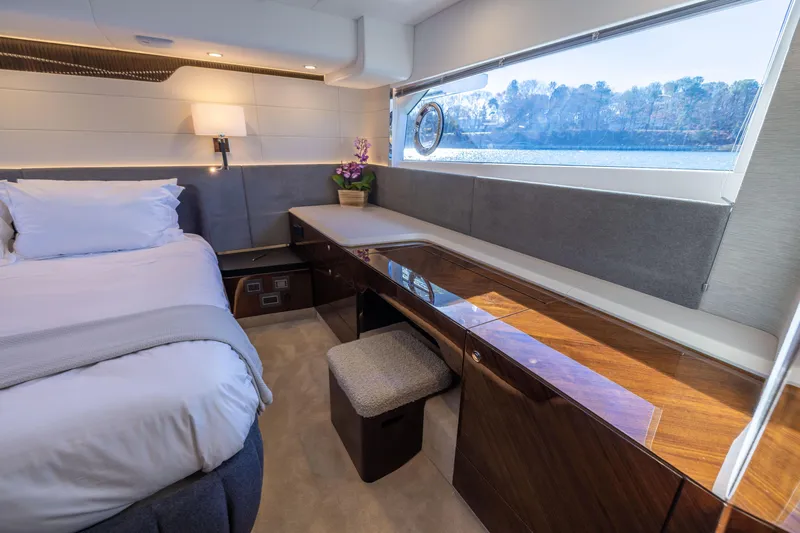 Slide: The Image of Luxurious cabin interior of 2025 Fairline Squadron 58 yacht with elegant wood finishes. - 54