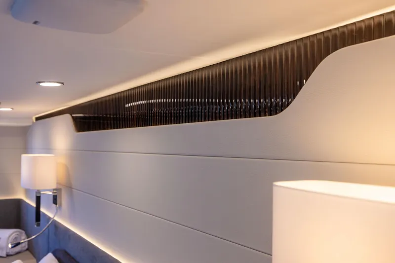 Slide: The Image of Luxurious interior of 2025 Fairline Squadron 58 yacht with modern lighting and sleek design. - 59