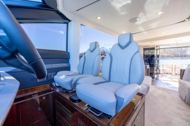 Slide: The Image of Interior of 2025 Fairline Squadron 58 yacht with luxurious seating and modern design. - 65