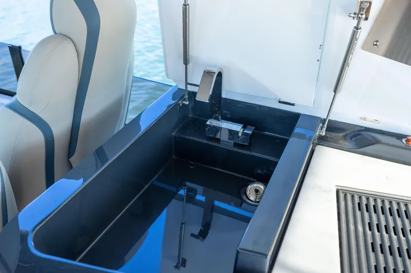 Slide: The Image of Luxury sink area on 2025 Fairline Squadron 58 yacht, featuring sleek design and modern fixtures. - 78