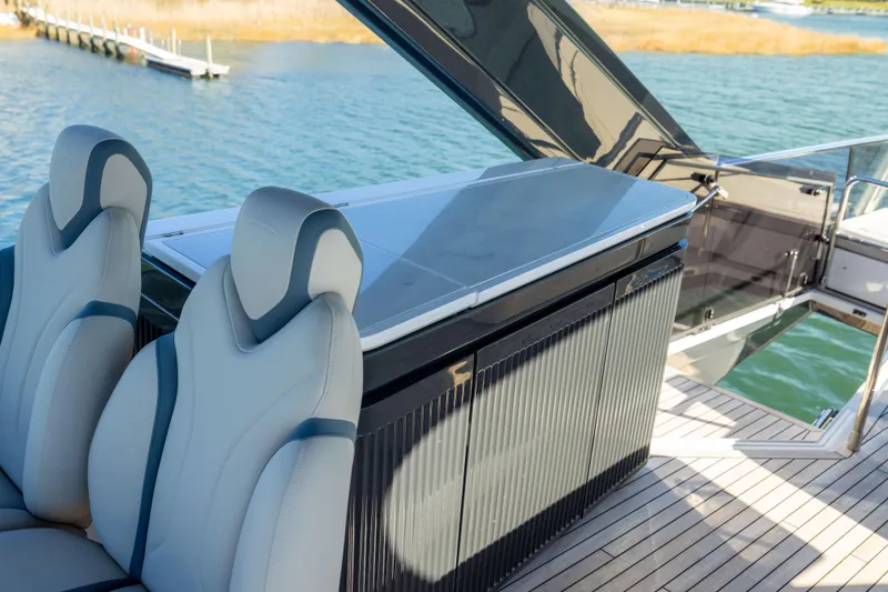 Slide: The Image of Luxury seating and sleek design on 2025 Fairline Squadron 58 yacht deck. - 83