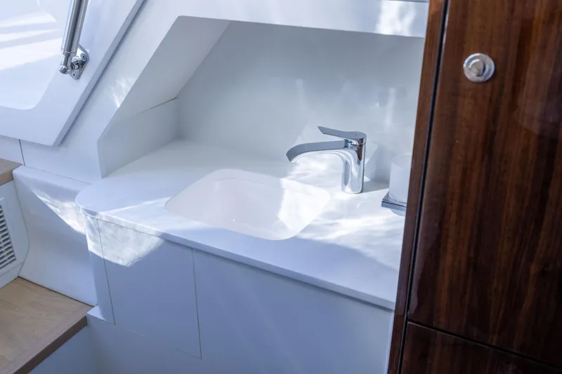 Slide: The Image of Modern bathroom sink in 2025 Fairline Squadron 58 yacht interior. - 95