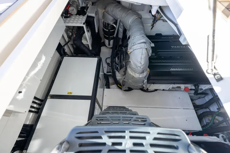 Slide: The Image of Engine room of 2025 Fairline Squadron 58 yacht, showcasing advanced machinery and components. - 97